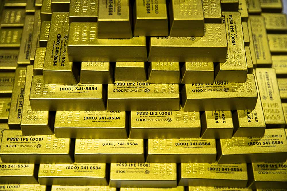 Emas batangan di stan Advantage Gold di National Harbor, Maryland, Amerika Serikat. Bloomberg/Al Drago