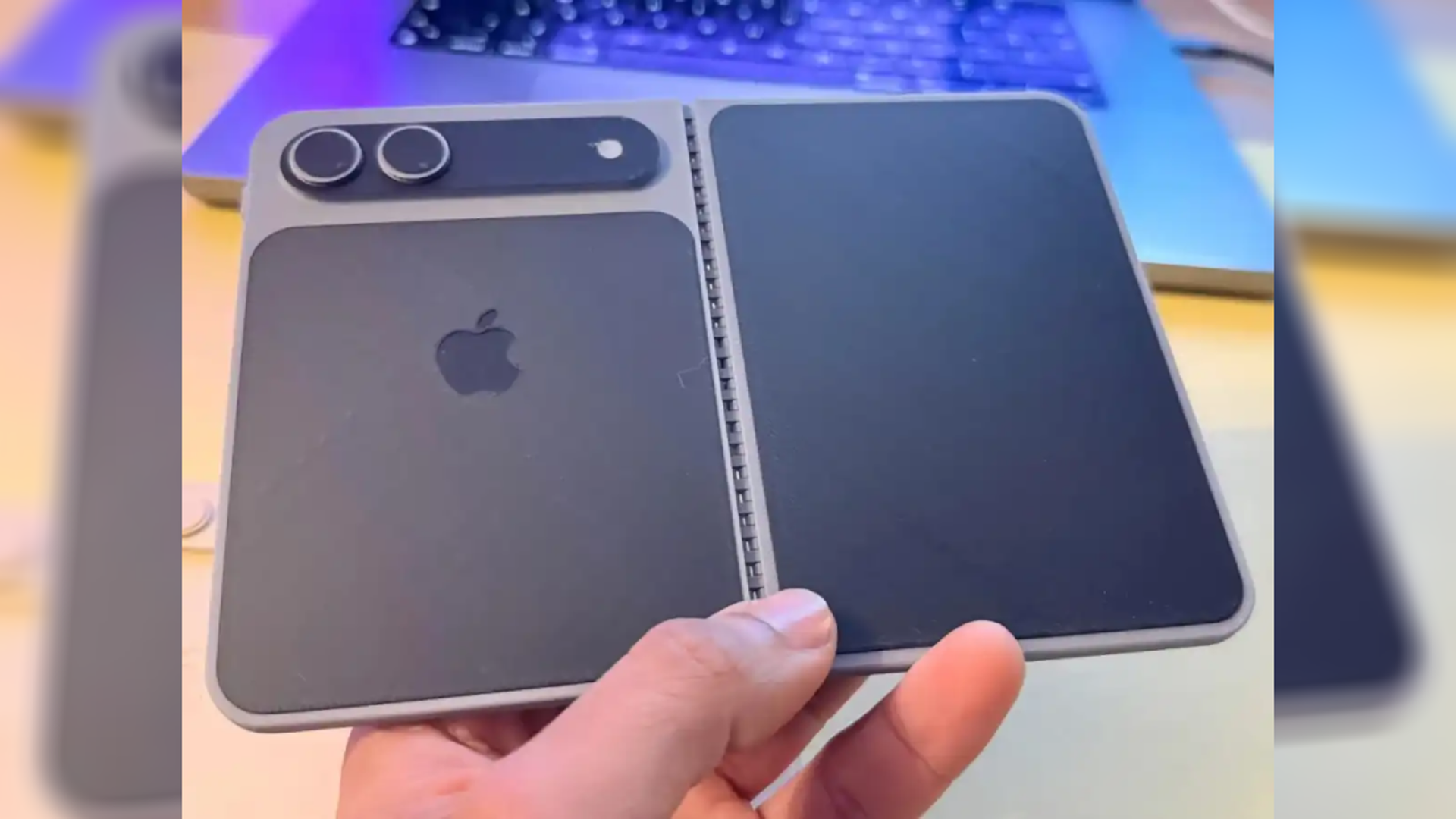 079525000_1766623498-iphone-fold-model-02
